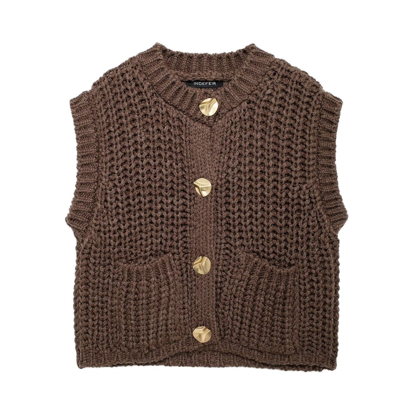 Gilet tricoté à boutons dorés